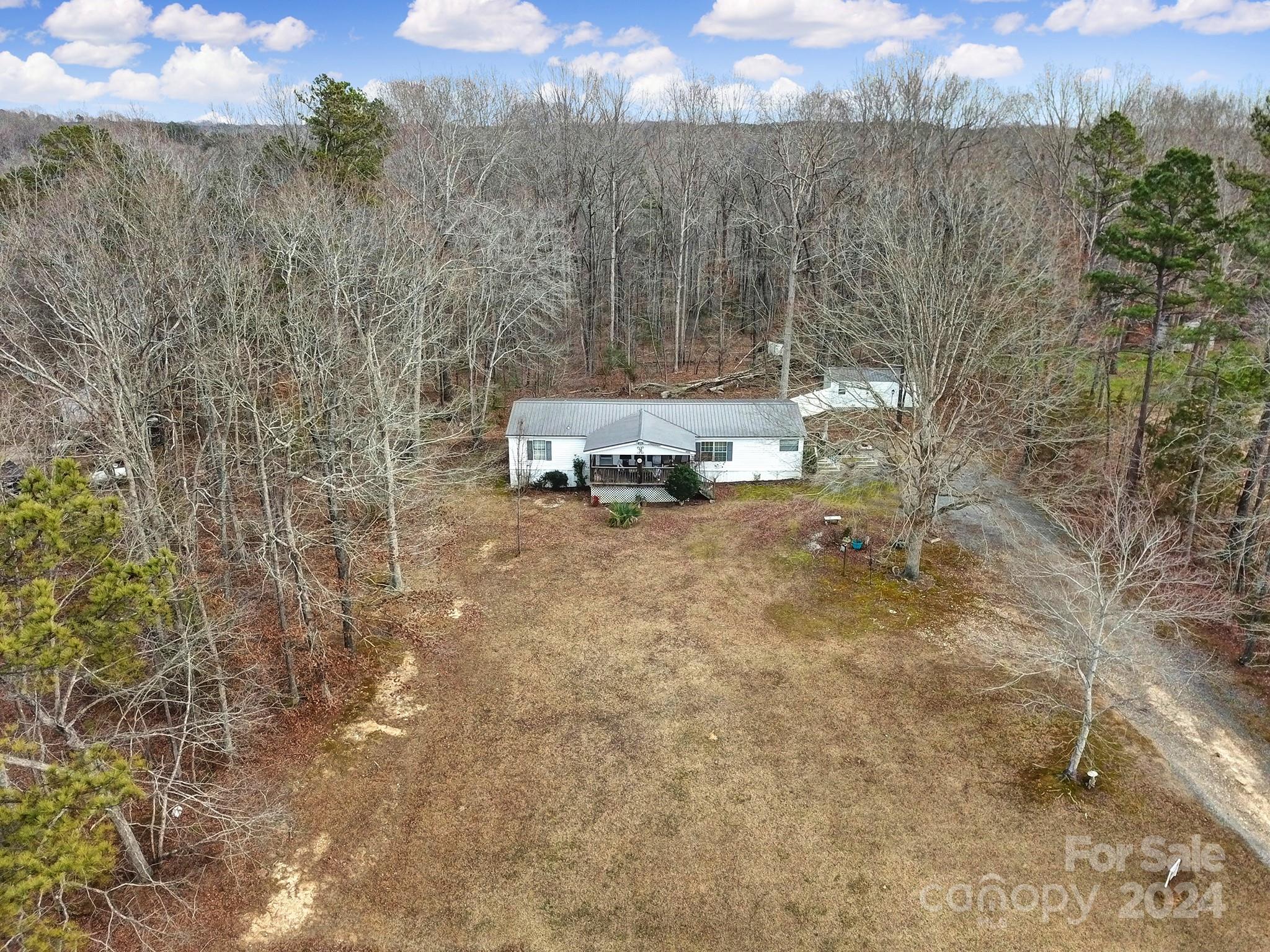 1950 Knight Road Lancaster, SC 29720 - Photo 22 of 24 a view of a city with tall trees