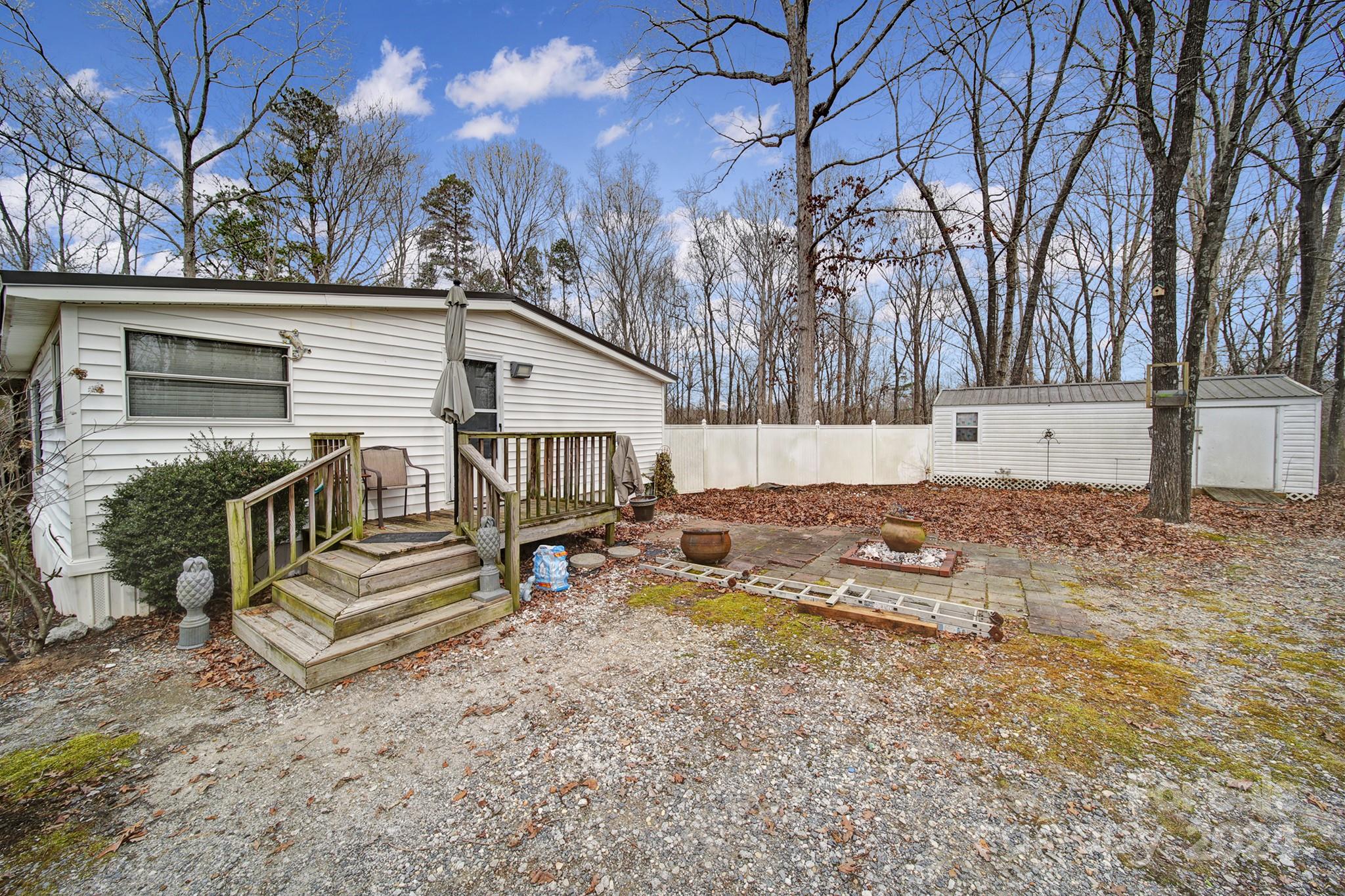1950 Knight Road Lancaster, SC 29720 - Photo 4 of 24 a view of a house with backyard and a tree