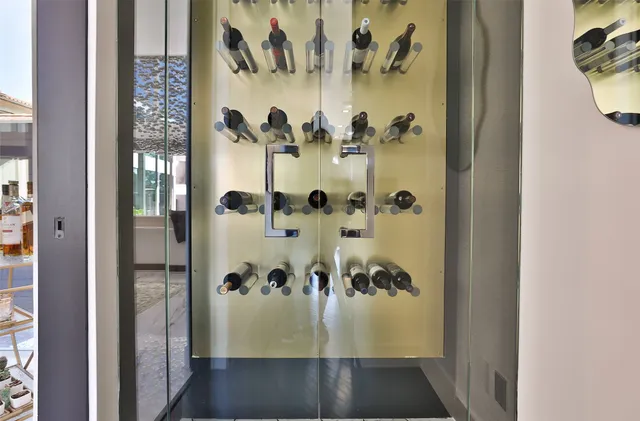 a view of kitchen with granite countertop cabinets table and chairs