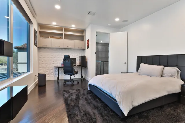 a view of a chairs and table in a patio