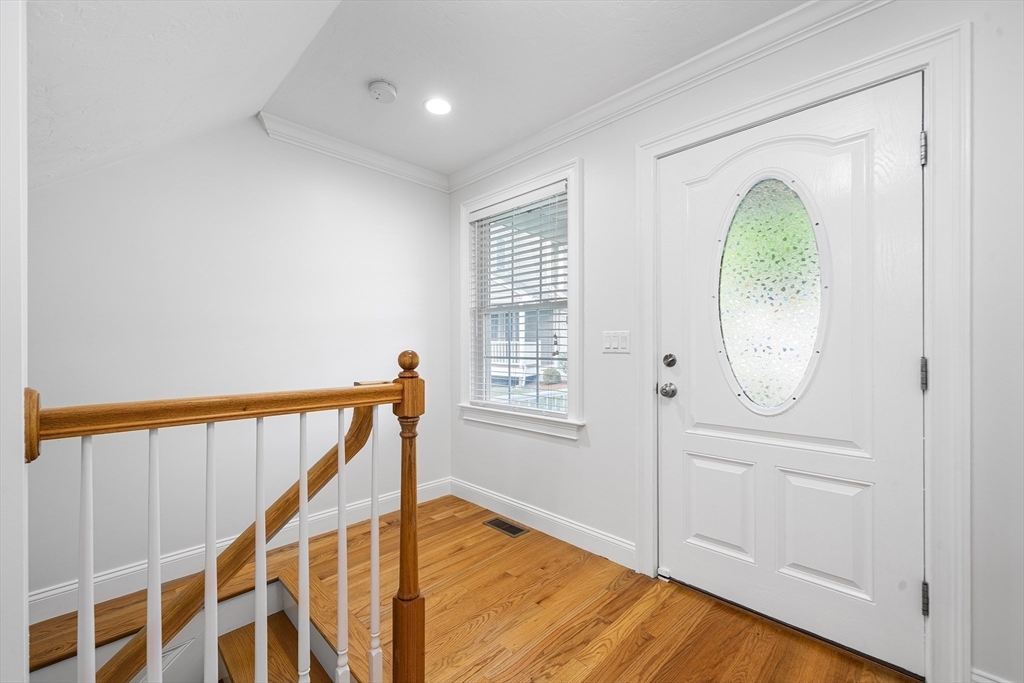 215 Rangeway Road, Unit 31 Billerica, MA 01862 - Photo 5 of 40 a view of an entryway with wooden floor
