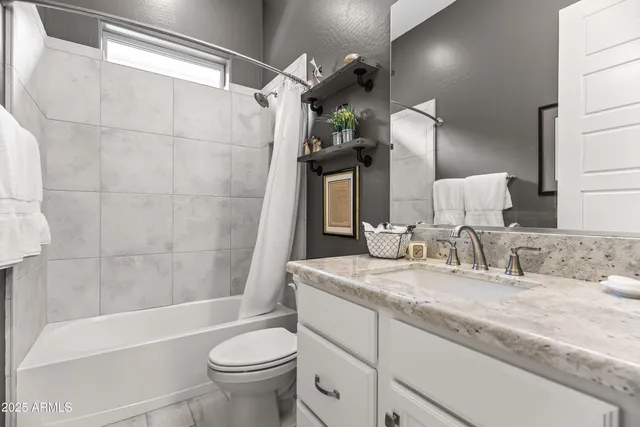 a room with painting and furniture