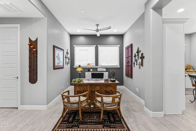 a view of a swimming pool with a patio and a yard