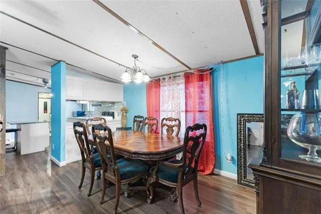 a bedroom with a bed and a desk