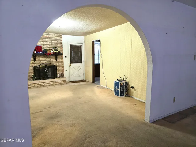a view of livingroom with kitchen