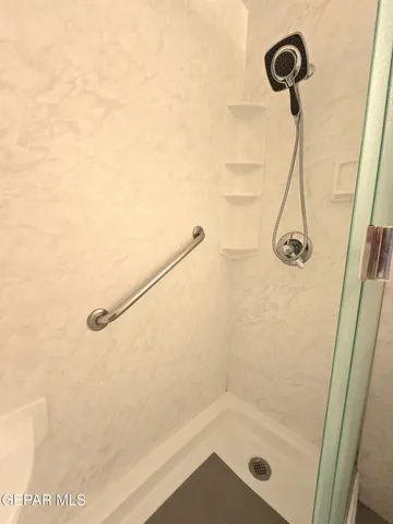 an empty room with a wooden door