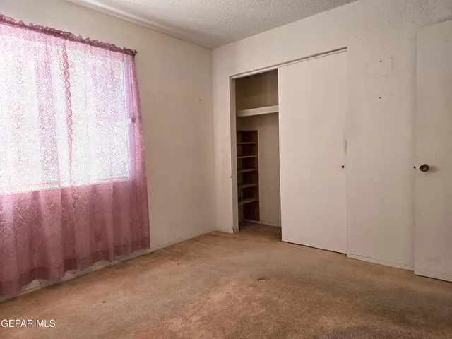 a view of a bathroom with a toilet and a sink