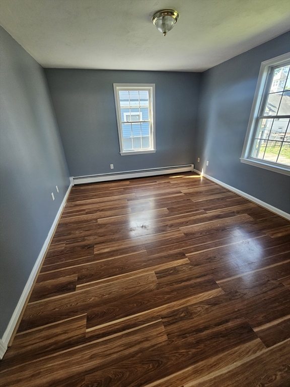 40 Merrick Street, Unit A Worcester, MA 01609 - Photo 27 of 32 a view of an empty room with windows