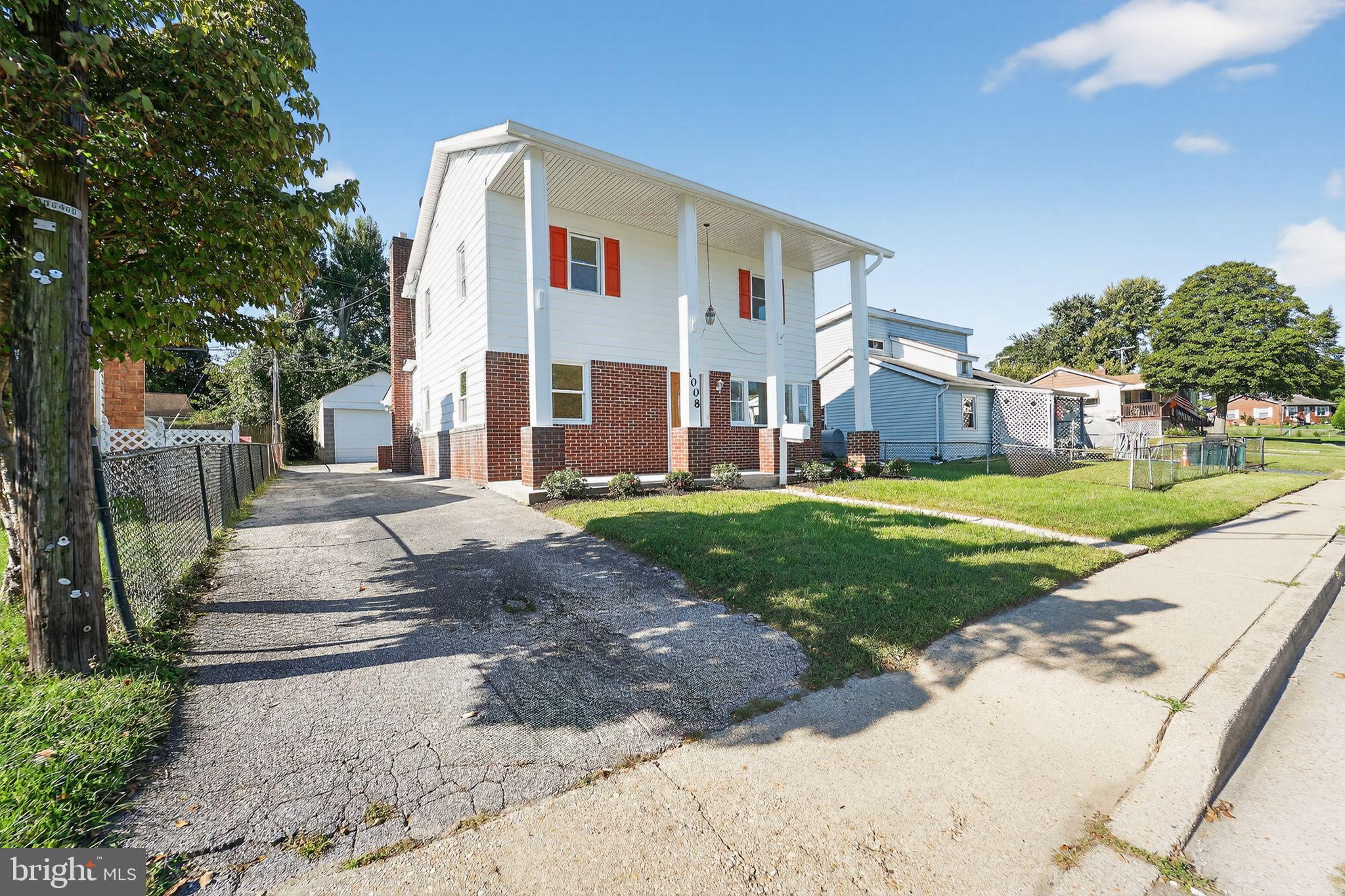 1008 Fuselage Avenue Baltimore, MD 21220 - Photo 27 of 30 a front view of house with yard