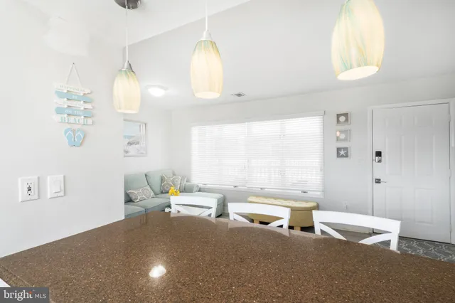 a bathroom with a sink a mirror and a shower