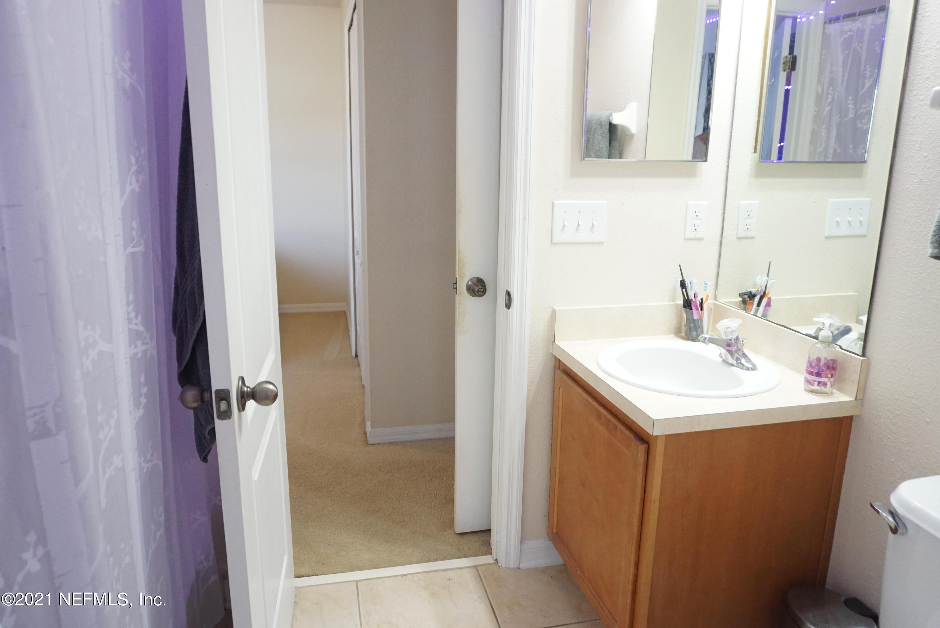 457 Cabernet Place St. Augustine, FL 32084 - Photo 13 of 19 a bathroom with a sink toilet and shower