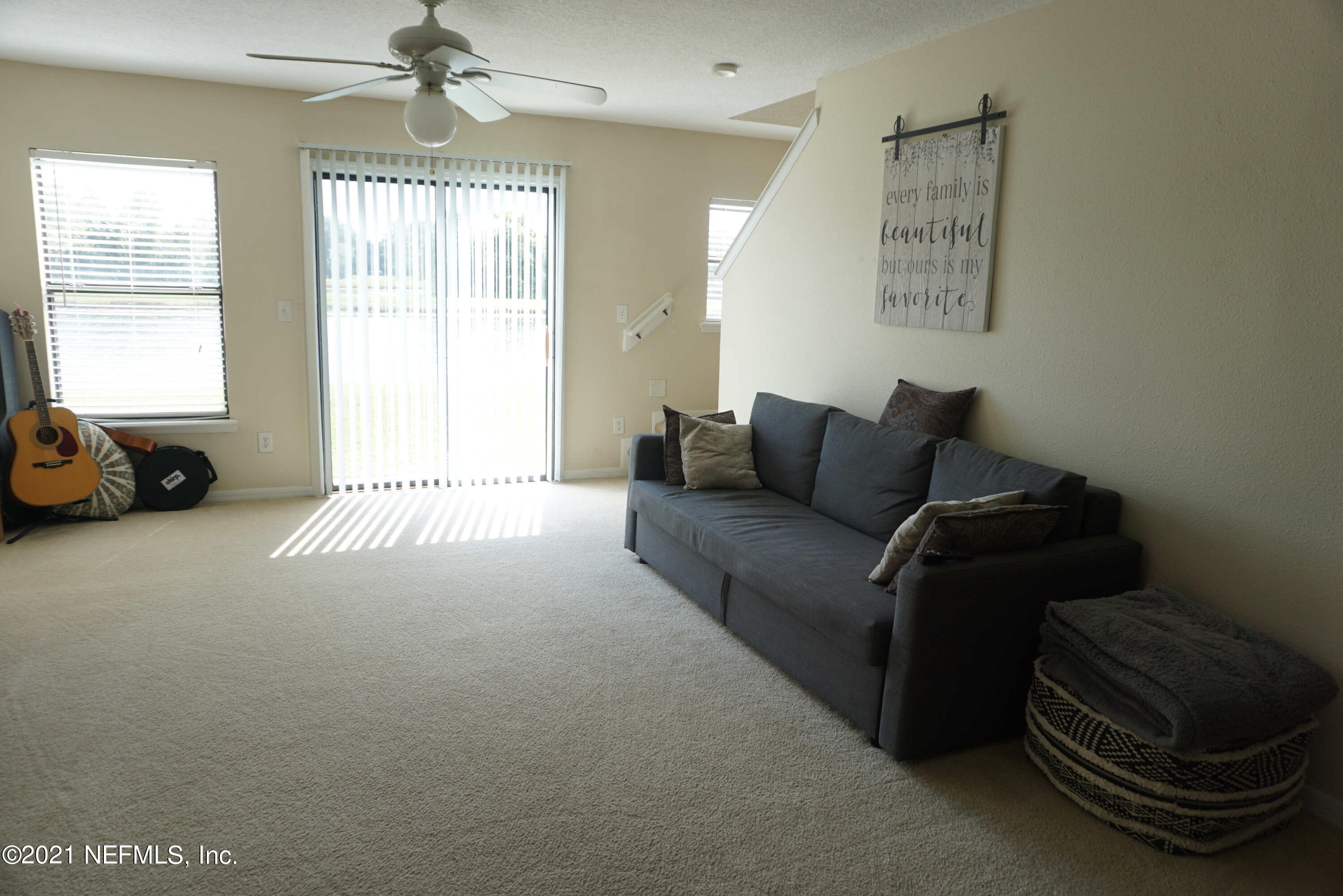 457 Cabernet Place St. Augustine, FL 32084 - Photo 3 of 19 a living room with furniture and a window