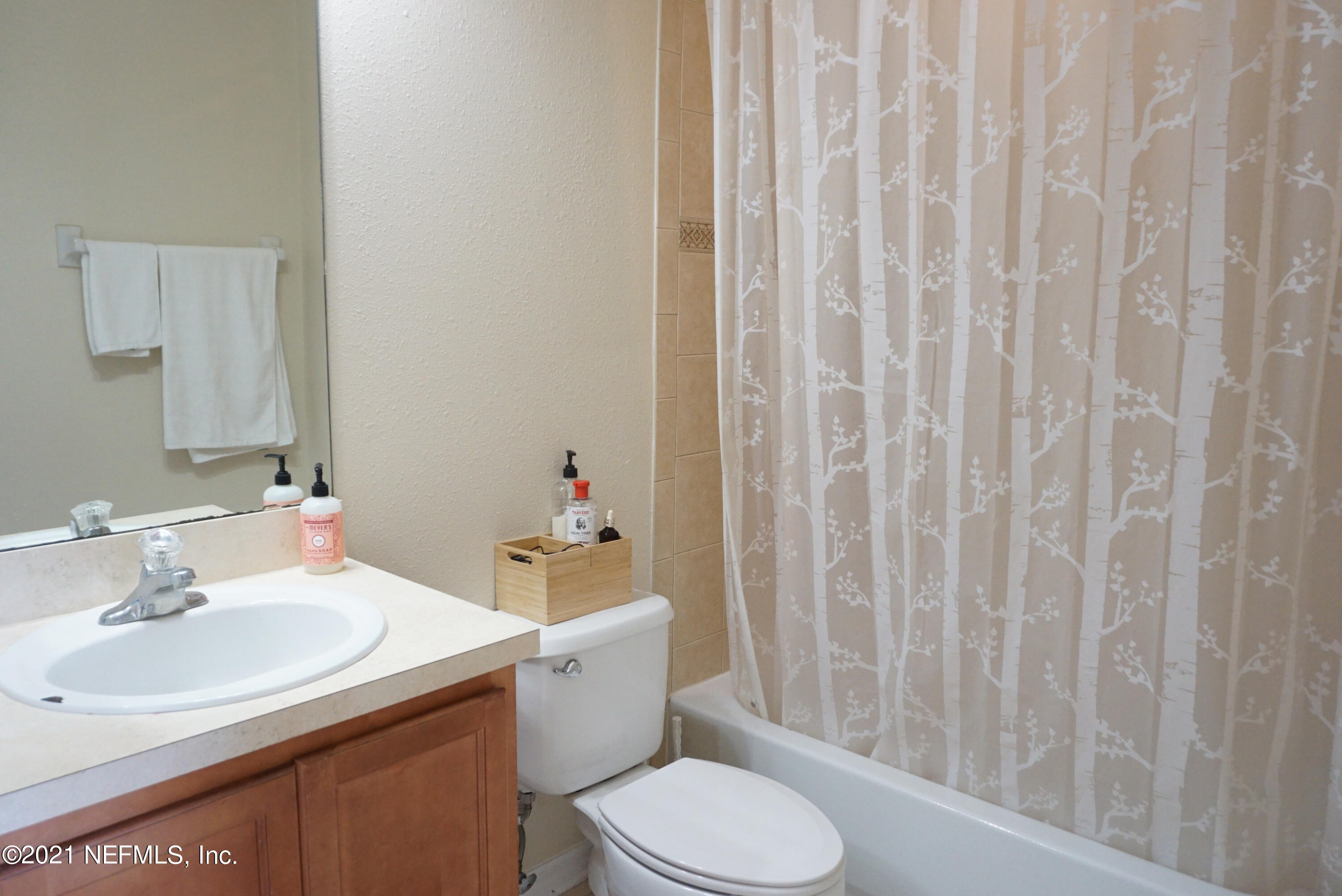 457 Cabernet Place St. Augustine, FL 32084 - Photo 10 of 19 a bathroom with a sink toilet and shower