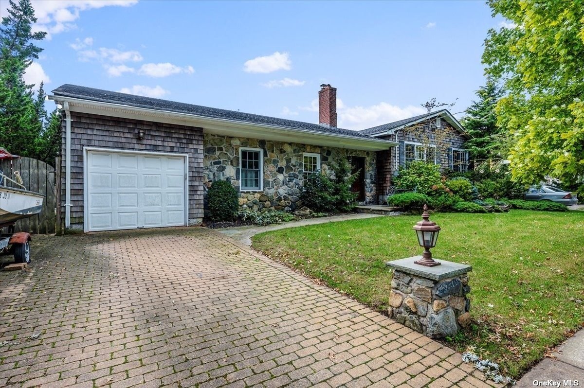 2404 Beverly Road Wantagh, NY 11793 - Photo 1 of 1 a view of multiple houses with outdoor space and lake view