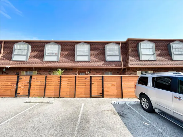 a car parked in front of a building