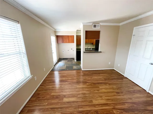 a view of a living room with a flat screen tv