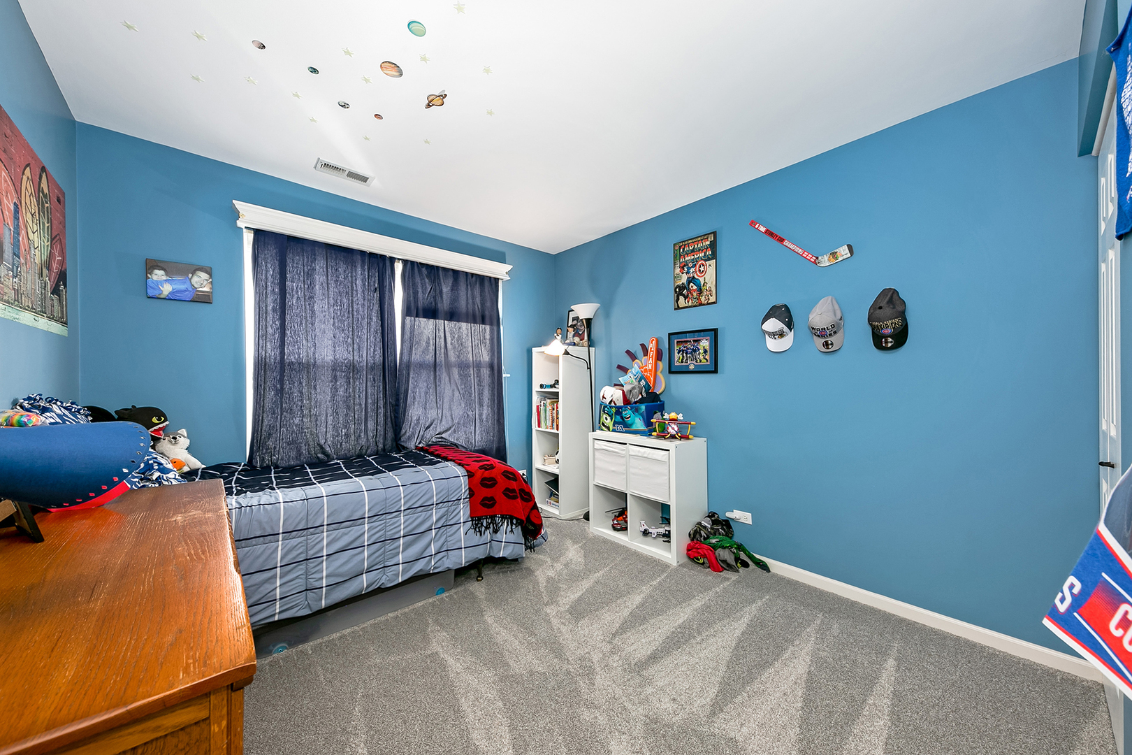 420 Butterfly Road Bolingbrook, IL 60490 - Photo 18 of 29 a bedroom with baby bed toys and dresser