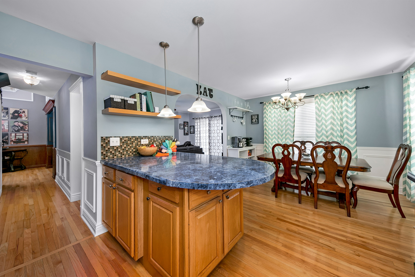 420 Butterfly Road Bolingbrook, IL 60490 - Photo 6 of 29 a kitchen with stainless steel appliances granite countertop a kitchen island a stove and a wooden floors