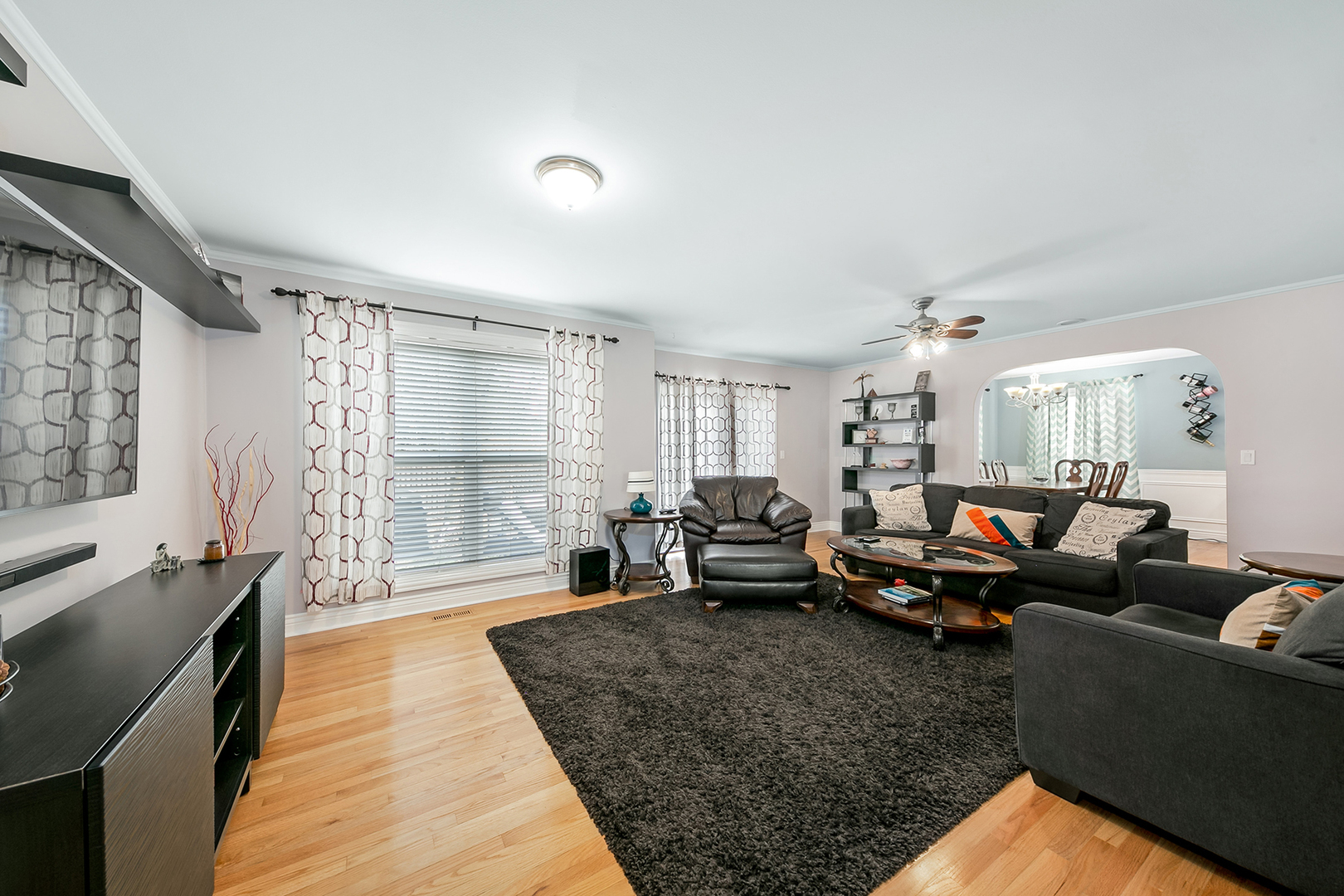 420 Butterfly Road Bolingbrook, IL 60490 - Photo 9 of 29 a living room with furniture rug and wooden floor