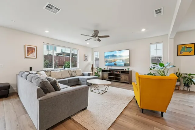 a bedroom with a bed and a desk