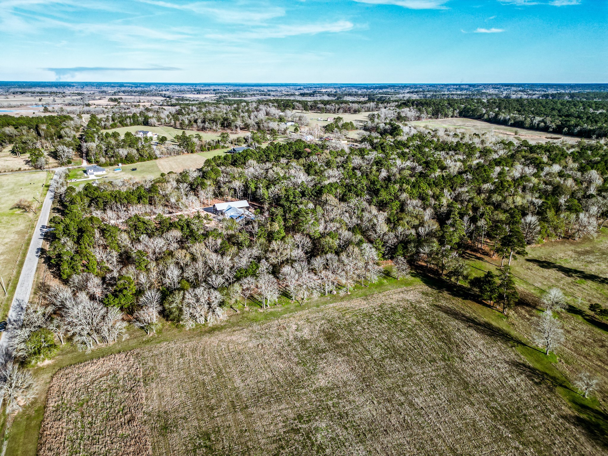 Tbd Jones Road New Waverly, TX 77358 - Photo 6 of 7 an aerial view of a houses with a yard