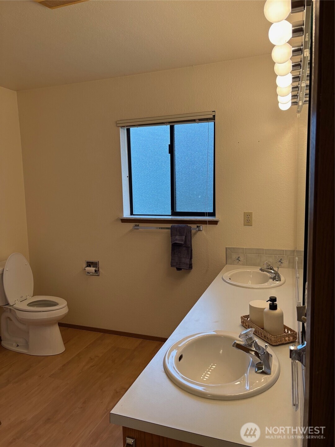 1352 Eastmont Avenue, Unit 15 East Wenatchee, WA 98802 - Photo 23 of 29 a bathroom with a sink and a toilet