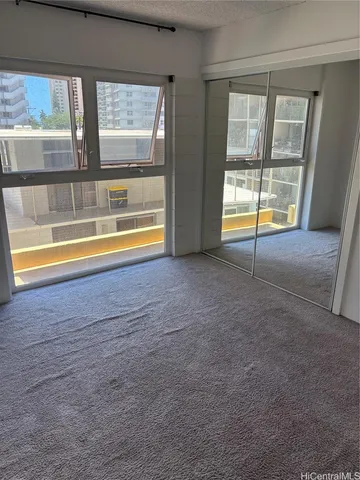 an empty room with window