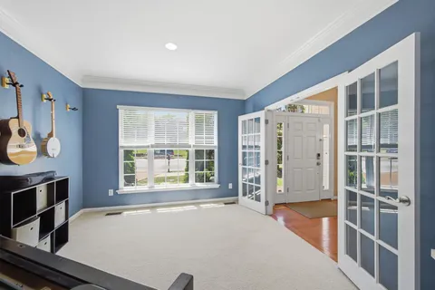 a view of an empty room and window