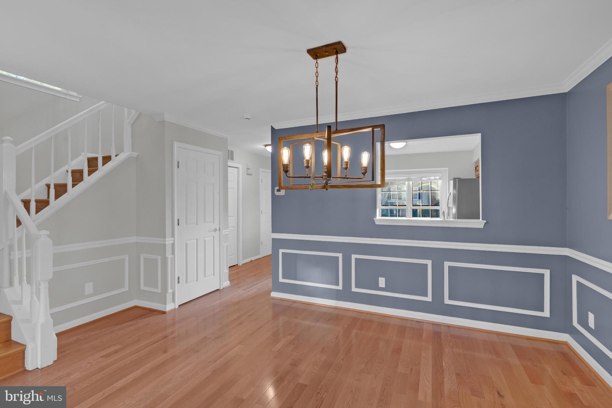 20888 Sandstone Square Sterling, VA 20165 - Photo 13 of 33 a view of an entryway with wooden floor