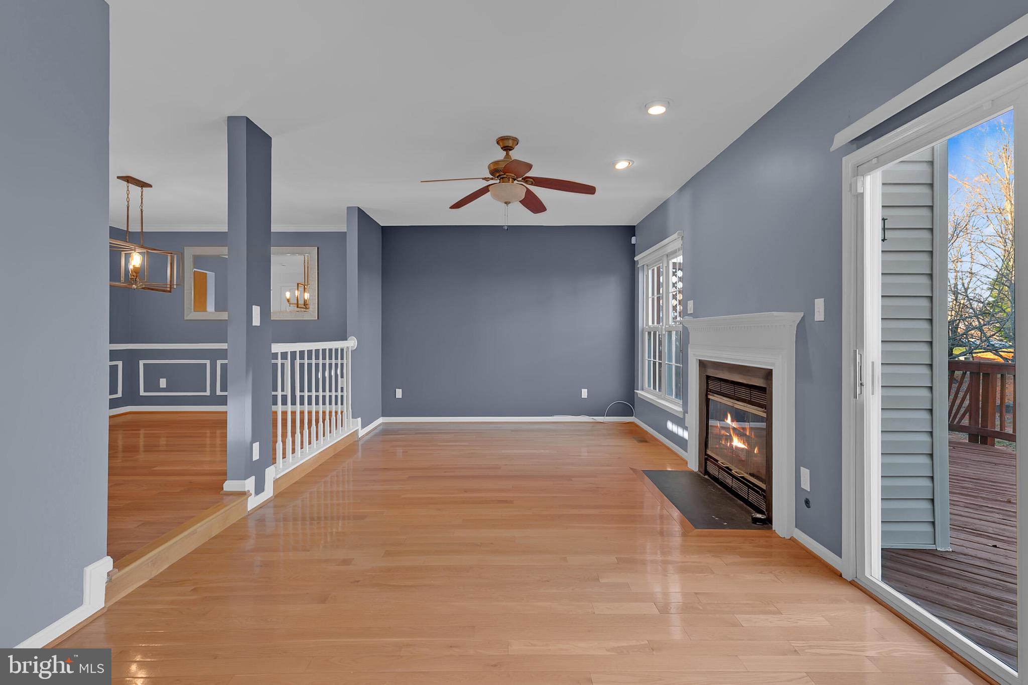 20888 Sandstone Square Sterling, VA 20165 - Photo 10 of 33 a view of a livingroom with a fireplace and cabinet