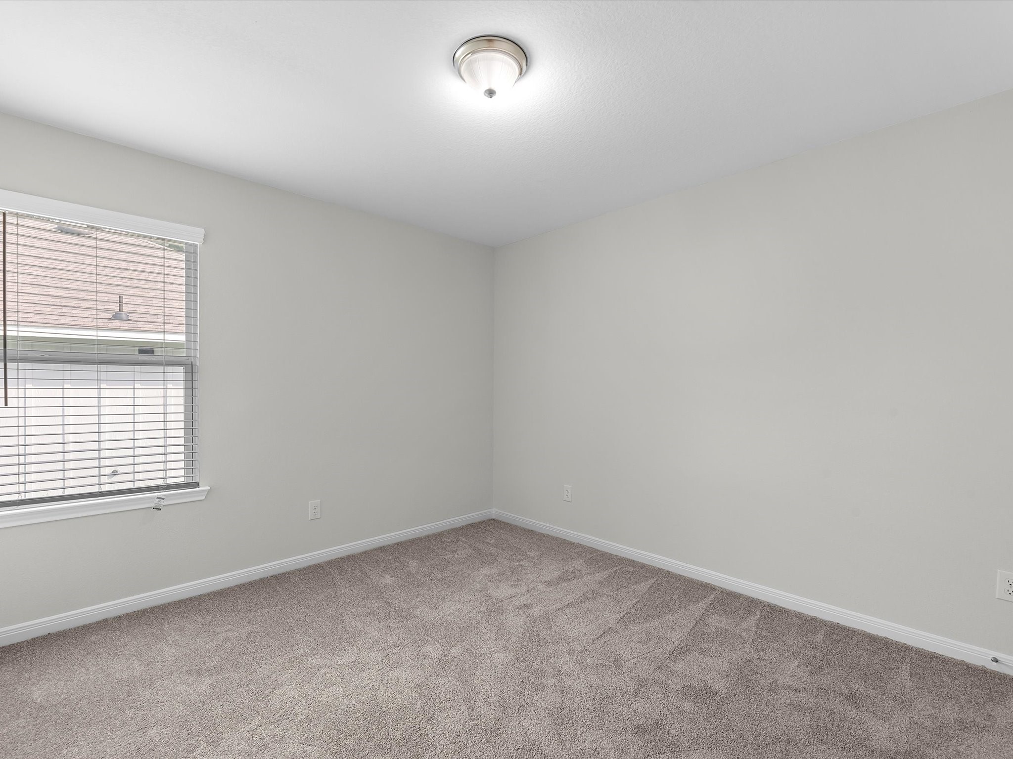 46 Fairway Drive Trinity, TX 75862 - Photo 16 of 26 an empty room with a window
