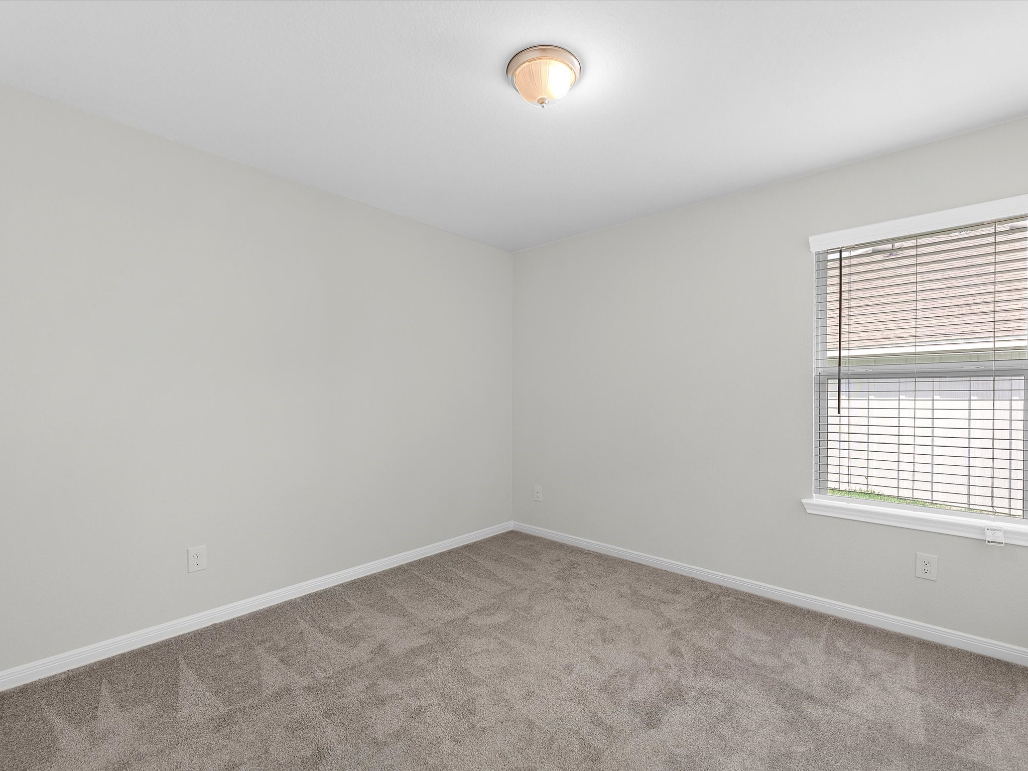 46 Fairway Drive Trinity, TX 75862 - Photo 18 of 26 an empty room with a window