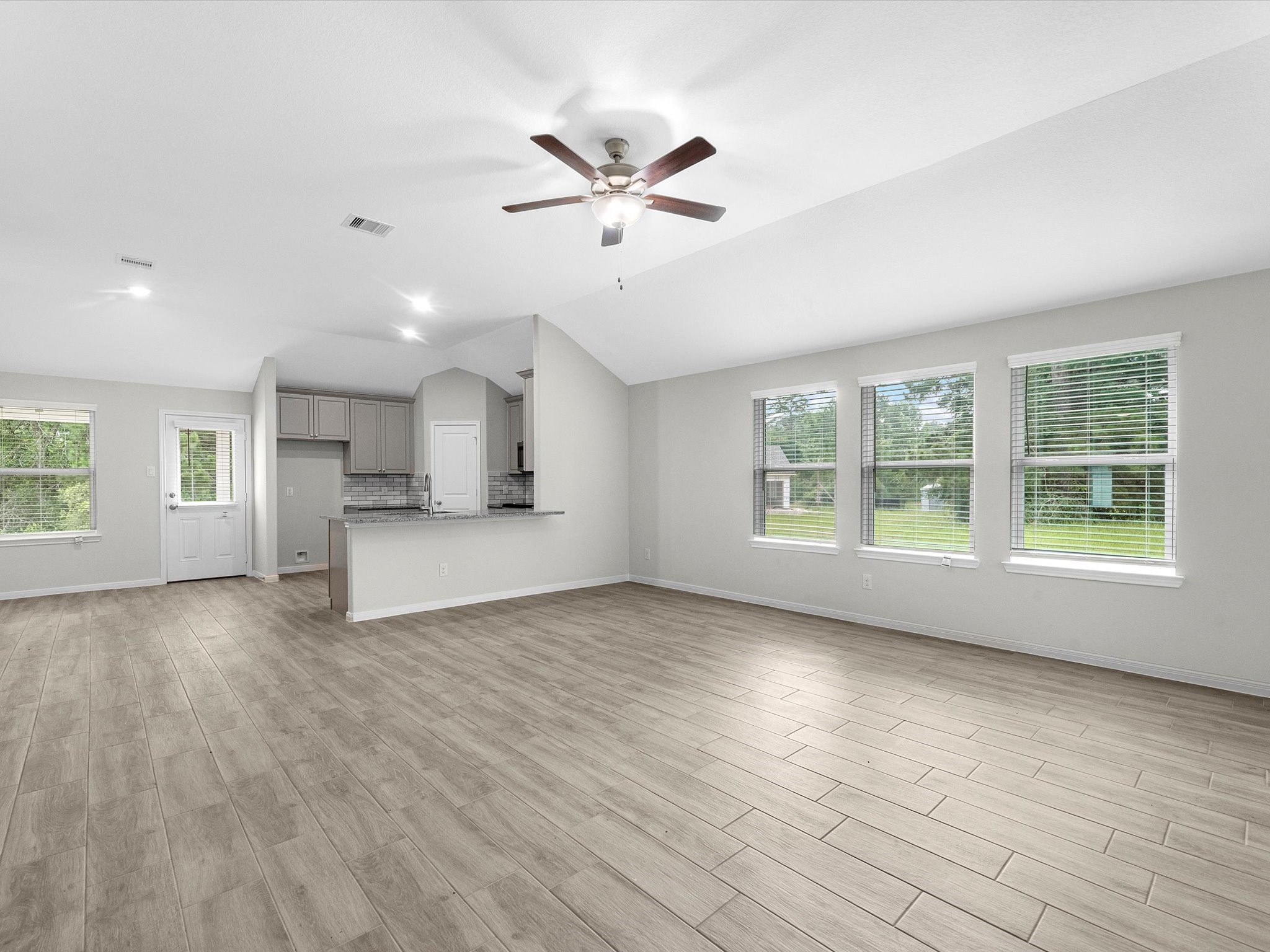 46 Fairway Drive Trinity, TX 75862 - Photo 4 of 26 a view of empty room with wooden floor and fan