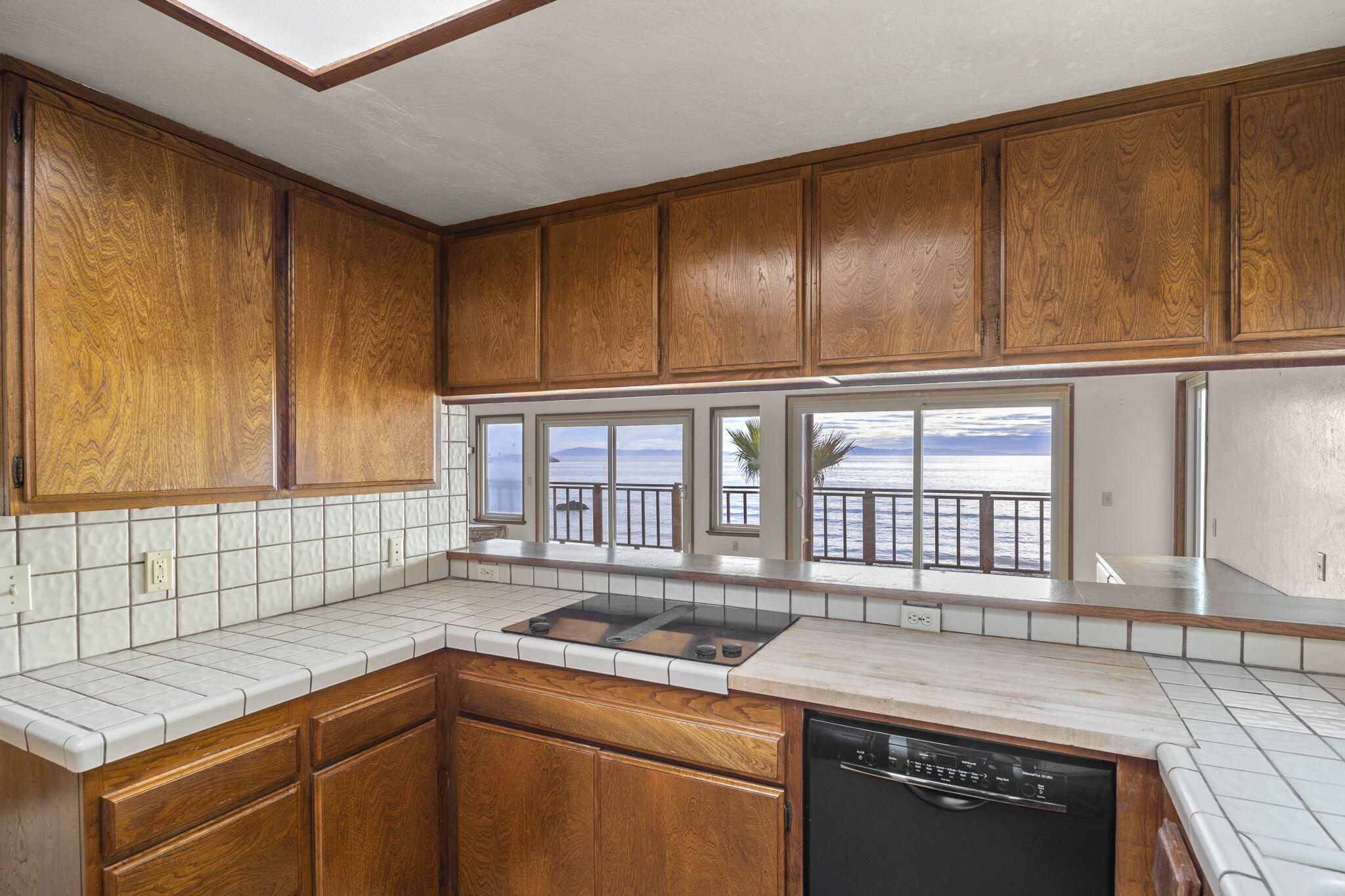 6726 Breakers Way Ventura, CA 93001 - Photo 16 of 42 a kitchen that has a sink and a stove