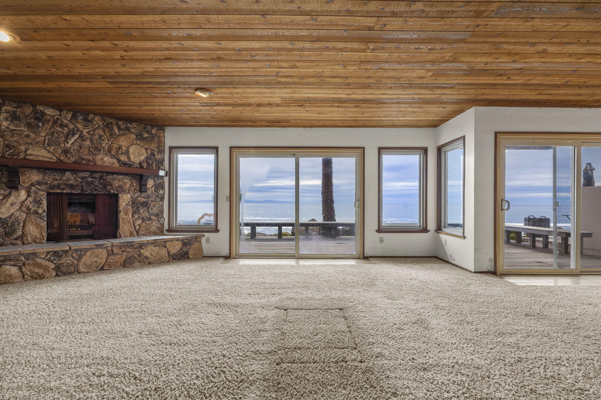 6726 Breakers Way Ventura, CA 93001 - Photo 22 of 42 a view of an empty room with a fireplace