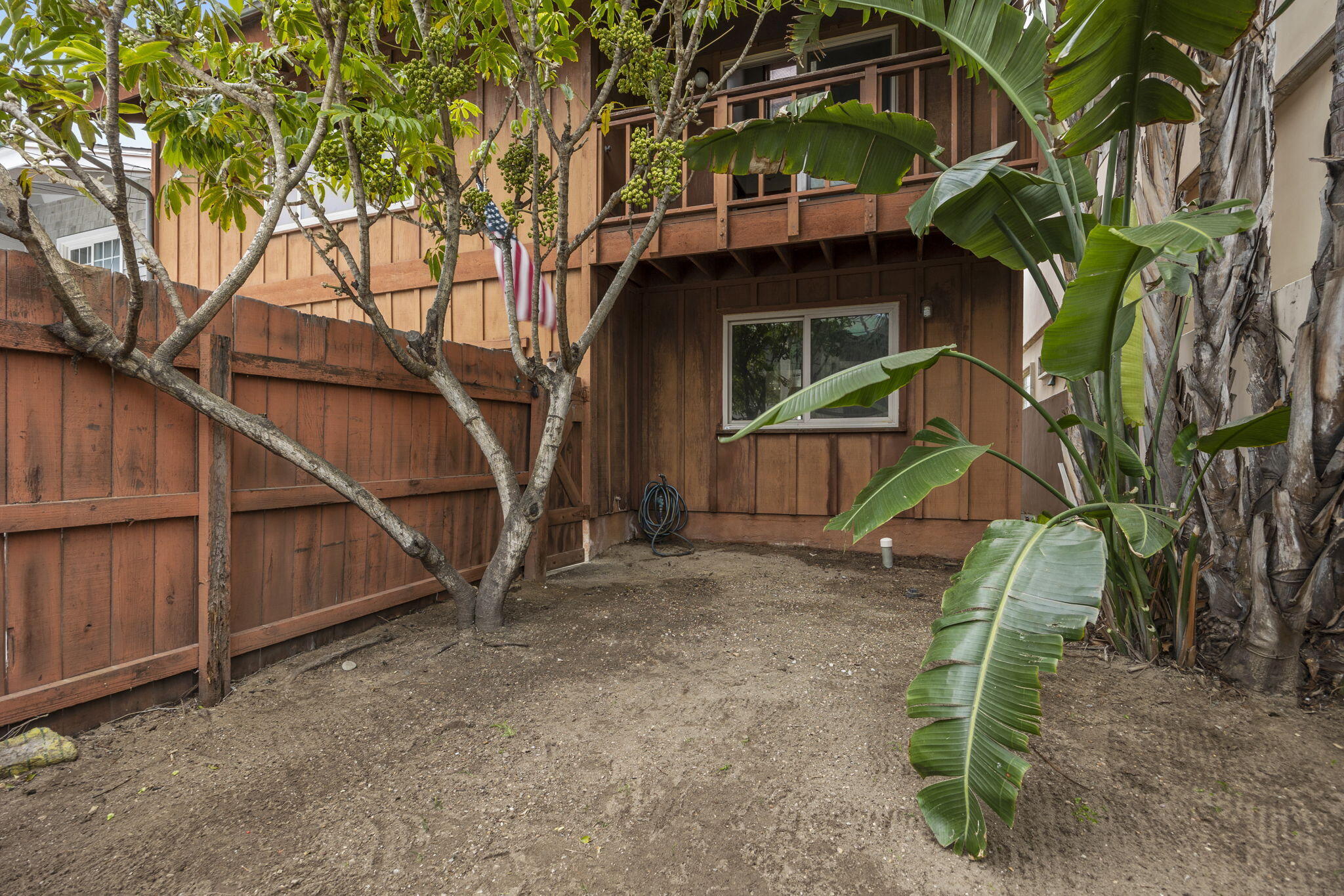 6726 Breakers Way Ventura, CA 93001 - Photo 36 of 42 a view of a wooden house with a yard