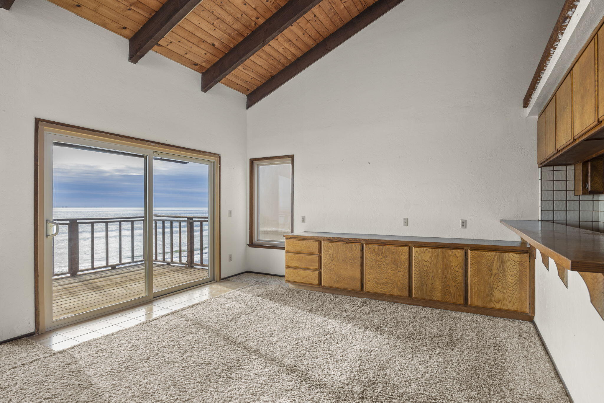 6726 Breakers Way Ventura, CA 93001 - Photo 10 of 42 a view of a porch with wooden floor and windows