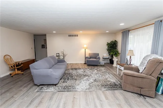 a living room with furniture and a couch