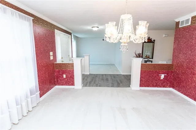 a workspace with furniture window and wooden floor