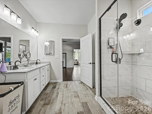 a kitchen with a sink and refrigerator