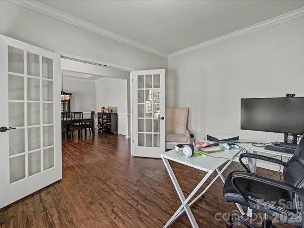 a room with furniture and gym equipment