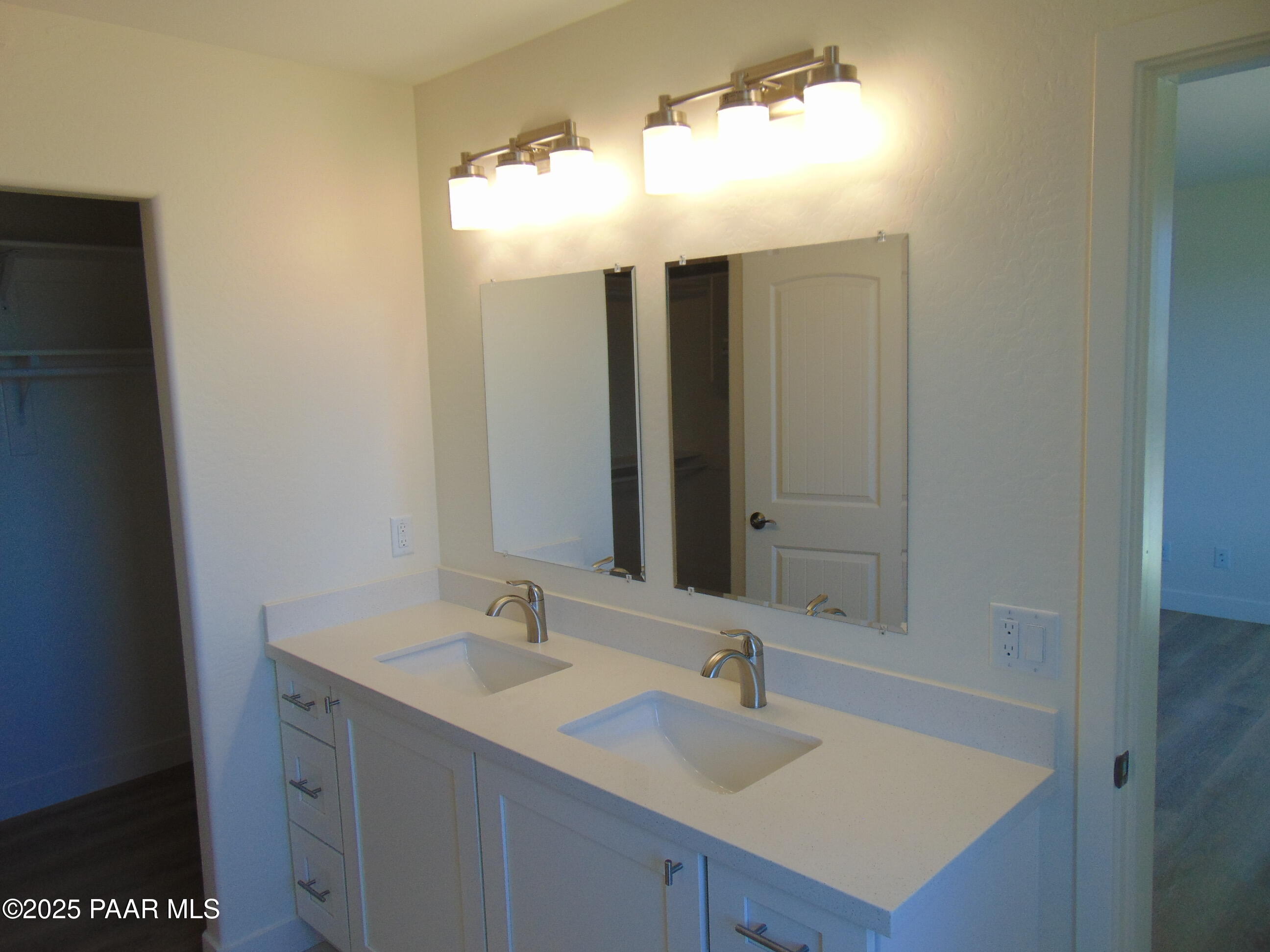 17707 East Jackrabbit Road Mayer, AZ 86333 - Photo 13 of 21 a bathroom with a sink vanity and mirror