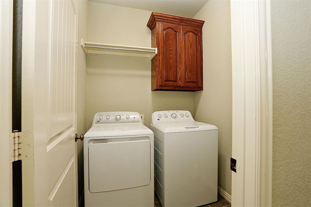 812 Ebenezer Road Palmer, TX 75152 - Photo 15 of 27 a utility room with dryer and washer