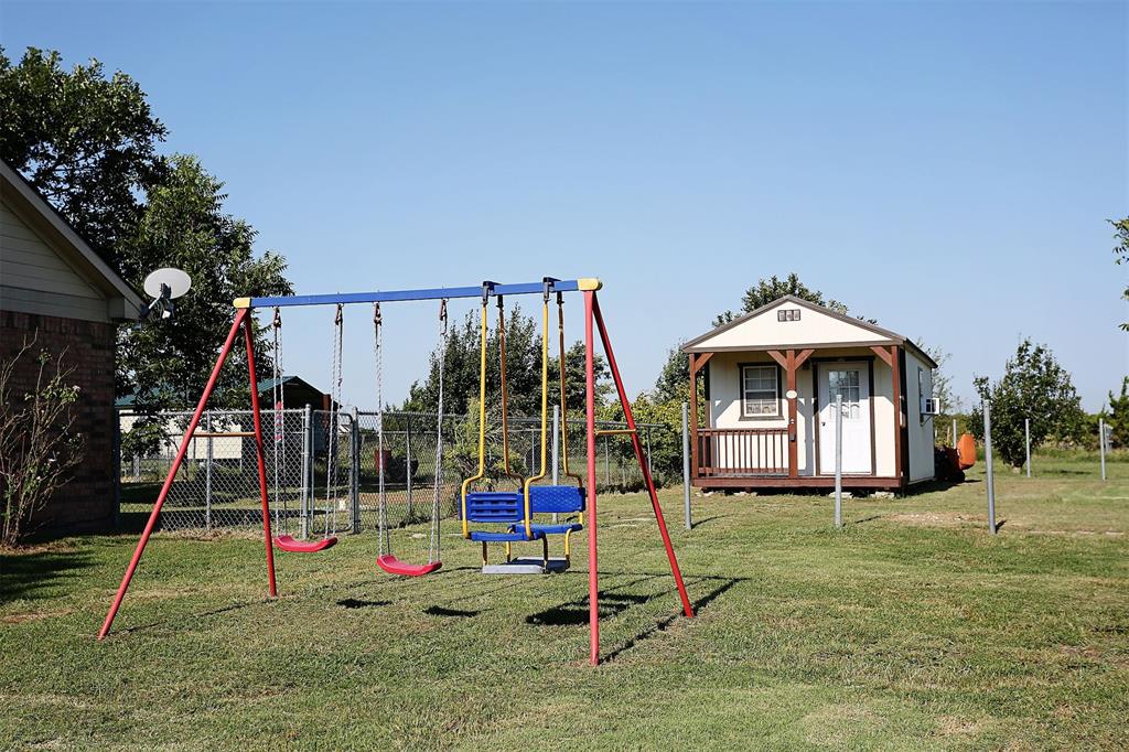 812 Ebenezer Road Palmer, TX 75152 - Photo 23 of 27 a view of yard with swimming pool and garden