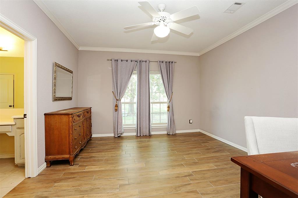 812 Ebenezer Road Palmer, TX 75152 - Photo 9 of 27 wooden floor in an empty room with a window