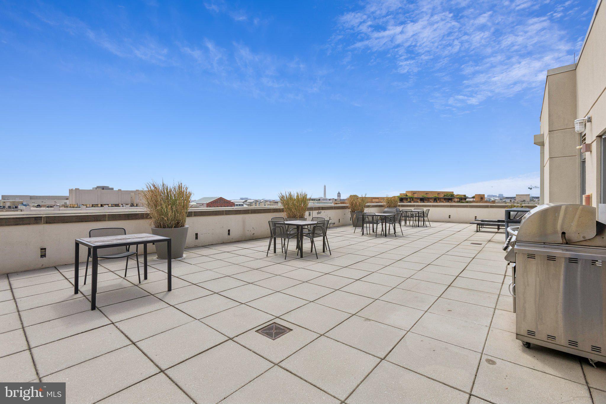 301 Massachusetts Avenue Northwest, Unit 606 Washington, DC 20001 - Photo 19 of 25 a view of a terrace with chairs