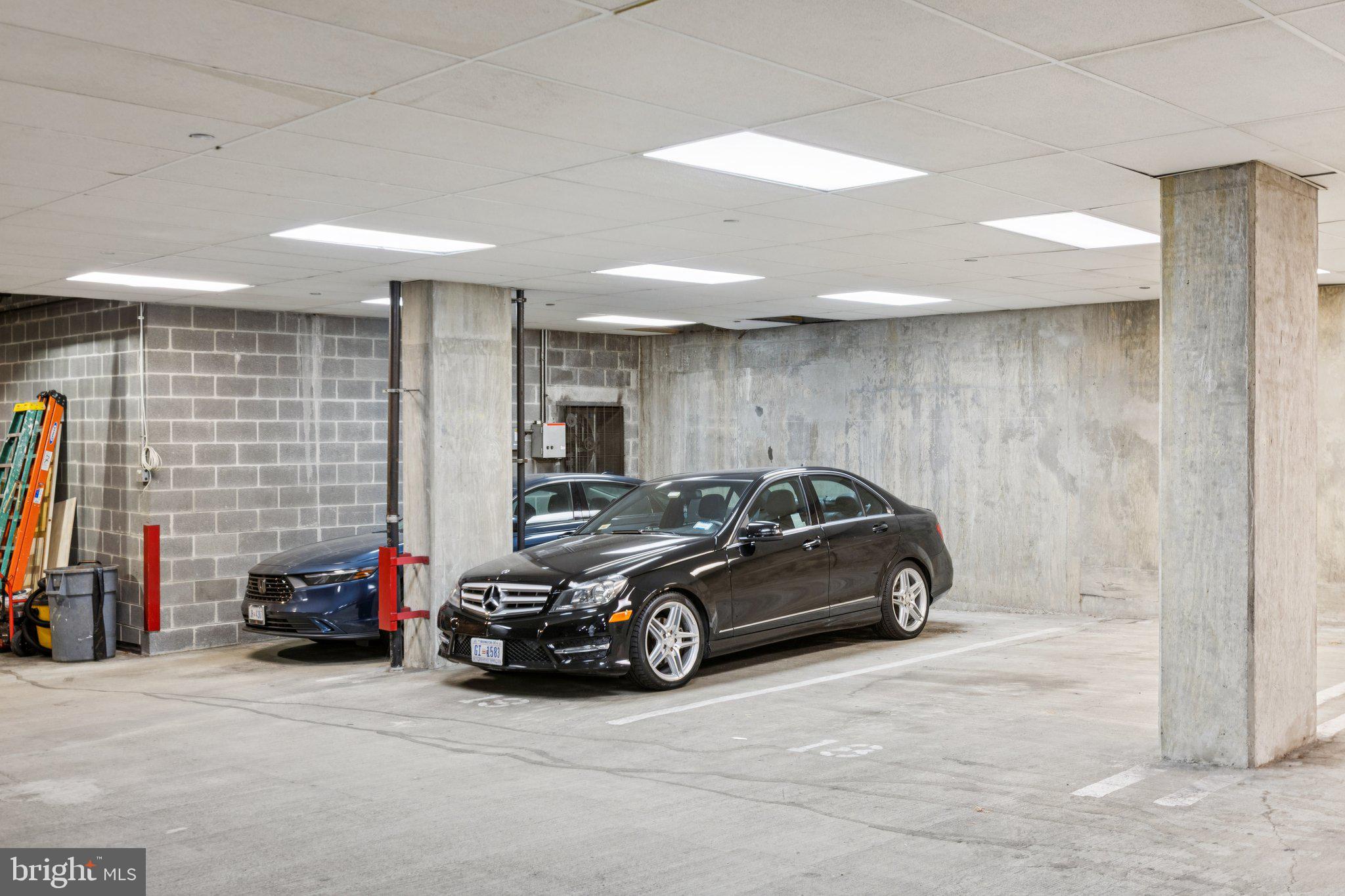 301 Massachusetts Avenue Northwest, Unit 606 Washington, DC 20001 - Photo 22 of 25 a car parked in garage