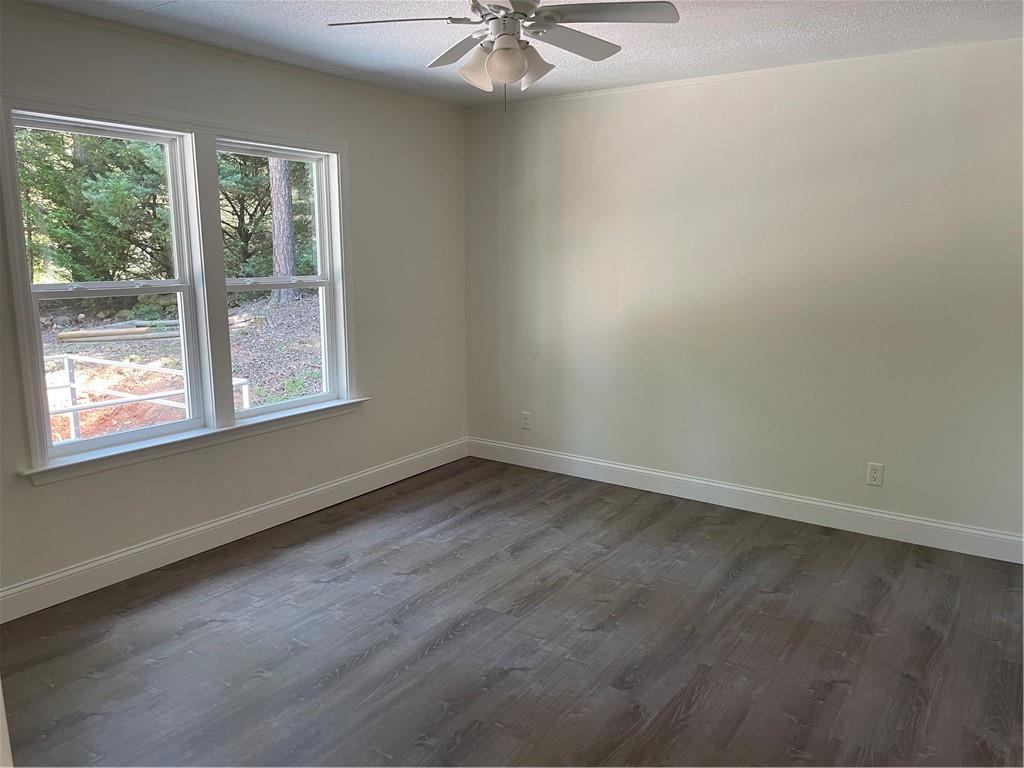 383 Bagwell Road Dawsonville, GA 30534 - Photo 12 of 24 an empty room with a window