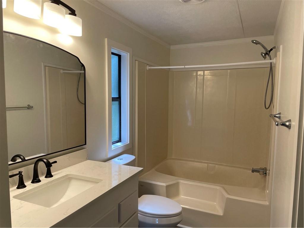 383 Bagwell Road Dawsonville, GA 30534 - Photo 13 of 24 a bathroom with a sink toilet and shower