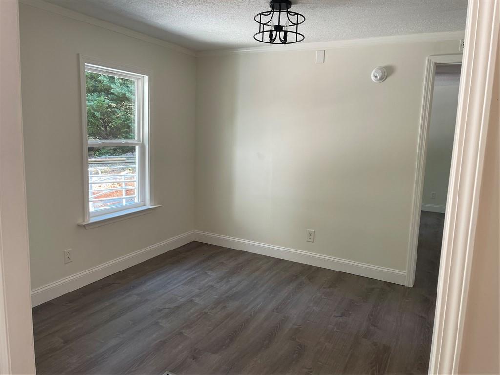 383 Bagwell Road Dawsonville, GA 30534 - Photo 5 of 24 an empty room with a window